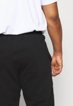 Pier One 2 Pack - Pantalones Deportivos - Black/Mottled Light Grey -Ropa Pier One 683bc01bd23348d49e0dcf1c7b683939